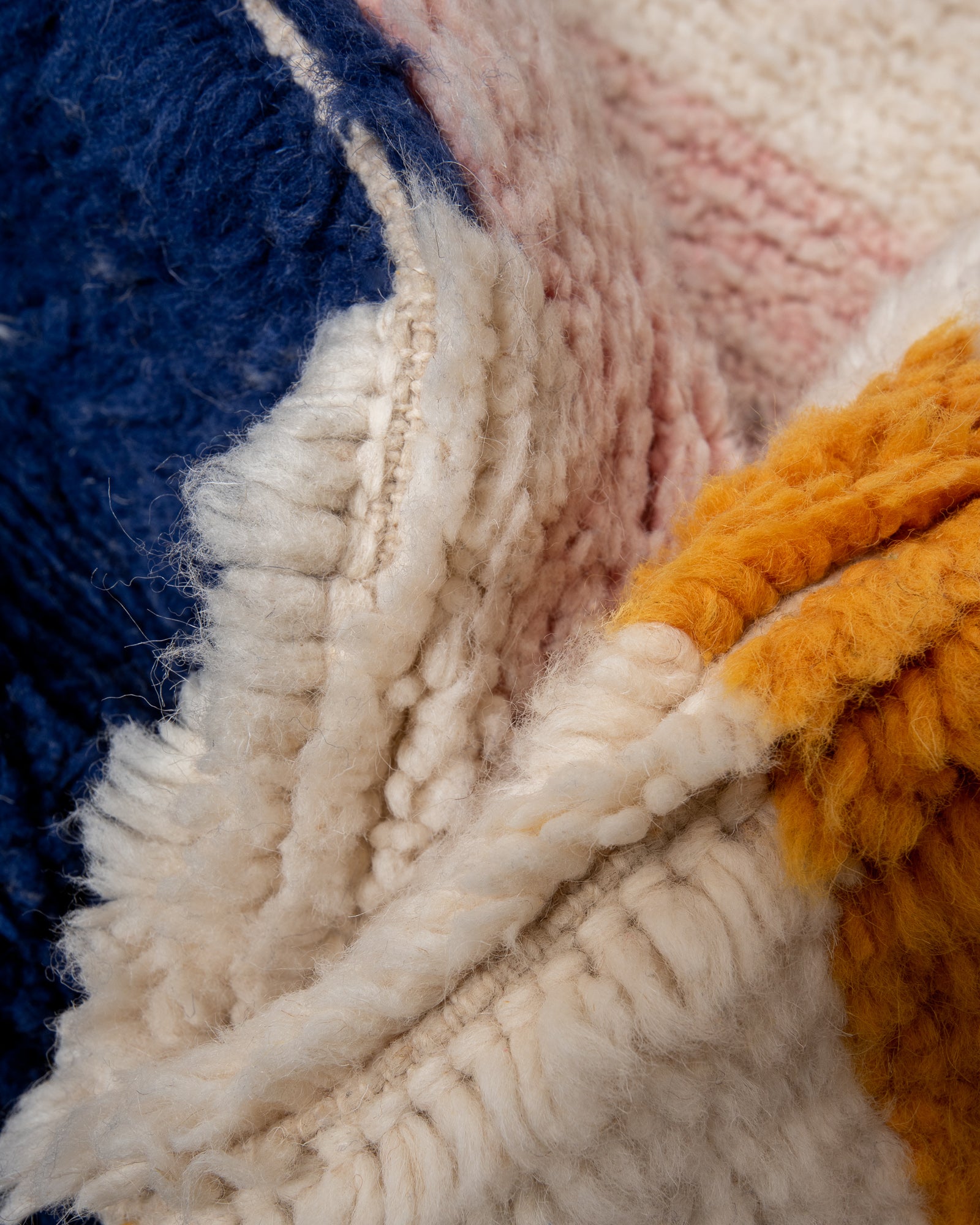 Modern, designer, handcrafted Berber rug from Morocco. Beniourain carpet with beautiful colours and patterns and fluffy wool texture.